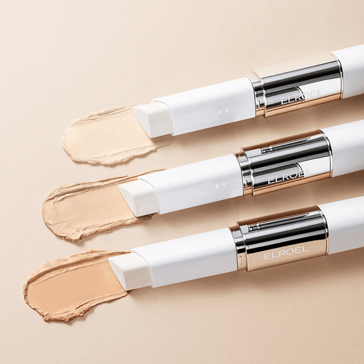 ELROEL Blanc Cover Cream Stick concealer mit integriertem Pinsel, mehrere Sticks in Reihe, die das Design und die Anwendung des Produkts zeigen.