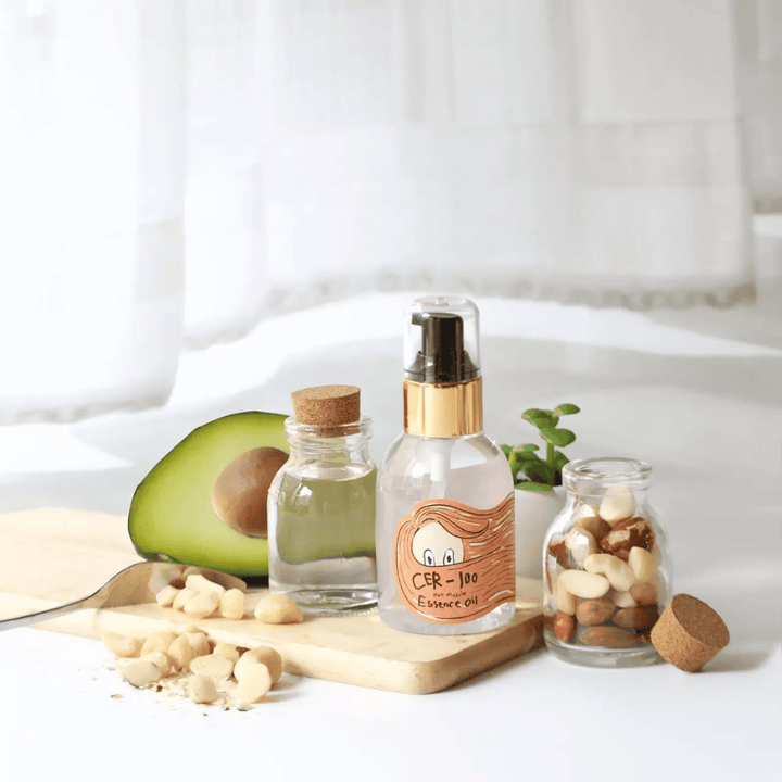 Elizavecca CER-100 Hair Muscle Essence Oil – koreanisches Haaröl mit Avocado und natürlichen Ölen, das hilft, trockenes und geschädigtes Haar mit Feuchtigkeit zu versorgen, zu stärken und Glanz zu verleihen.