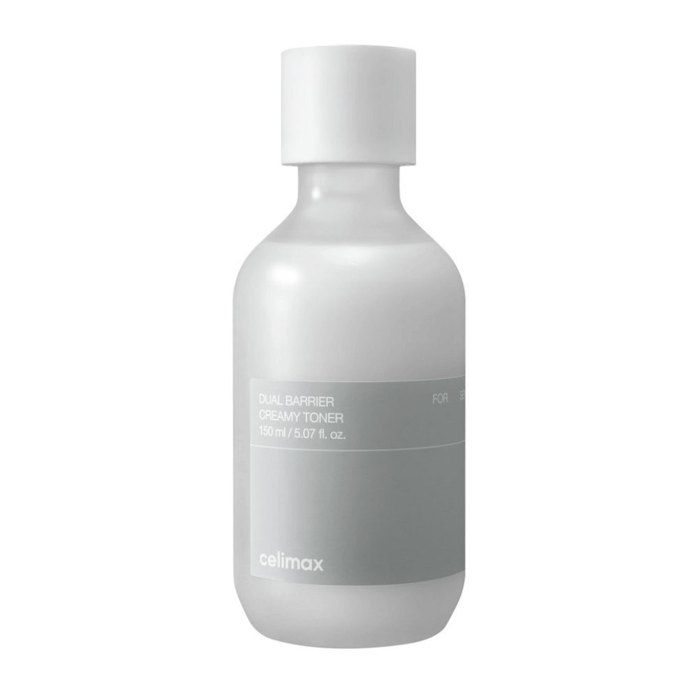 Weiße Flasche mit grauem Etikett für Celimax Dual Barrier Creamy Toner – ein feuchtigkeitsspendender Toner mit milder Formel, speziell entwickelt für empfindliche und trockene Haut.