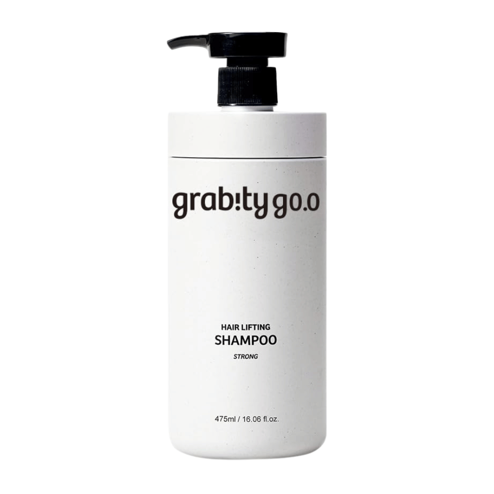 Grabity g0.0 Hair Lifting Shampoo Strong in einer stilvollen weißen Pumpflasche vor weißem Hintergrund, entwickelt, um Volumen, Stärke und einen volleren Haareindruck zu verleihen.