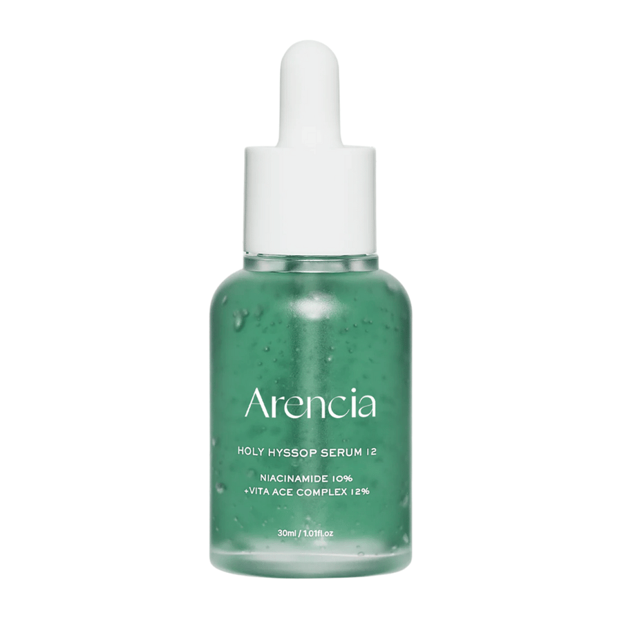 Arencia Holy Hyssop Serum 12 in einer grünen Glasflasche mit Pipette, Gesichtsserum mit 10 % Niacinamid und 12 % Vitamin-ACE-Komplex.