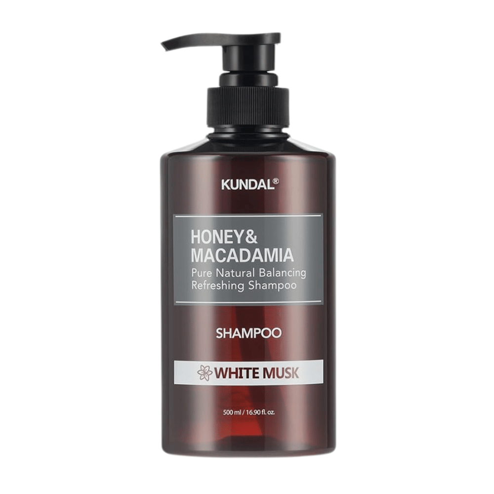KUNDAL Honey & Macadamia Nature Shampoo White Musk in brauner Plastikflasche mit Pumpe, 500 ml.