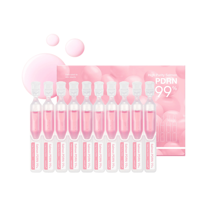 Medicube PDRN Pink One Day Serum Set mit zehn einzelnen Ampullen und Produktverpackung. Das Set enthält ein Serum mit 99 % hochgereinigtem Lachs-PDRN für Feuchtigkeit, Ausstrahlung und die tägliche Hautpflege.