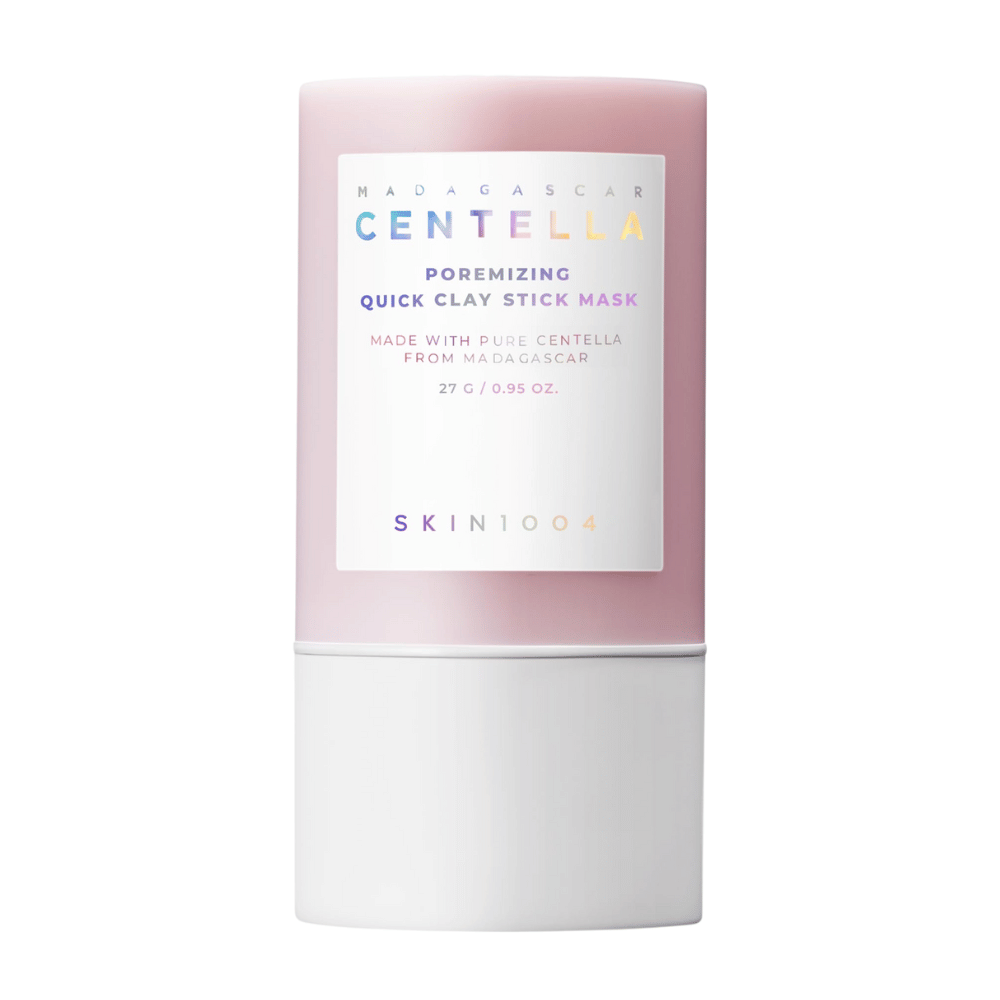 SKIN1004 Madagascar Centella Poremizing Quick Clay Stick Mask in einer stilvollen rosa und weißen Verpackung. Tonmaske im Stickformat für eine reine und frische Haut.