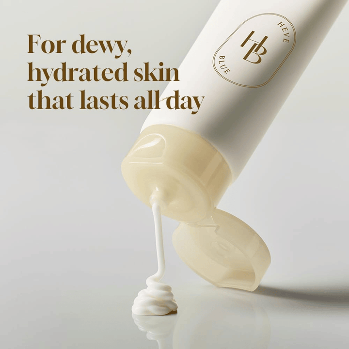 Salmon Caring Centella Cream mit PDRN 5000ppm, die aus der Tube gedrückt wird – feuchtigkeitsspendende Gesichtscreme für taufrische und langanhaltend befeuchtete Haut.