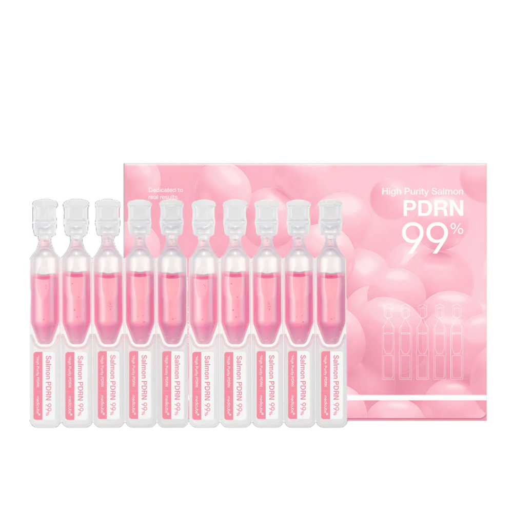 Medicube High Purity Salmon PDRN 99% – en ask med rosa ampuller fyllda med koncentrerat lax-DNA-serum för hudförnyelse och förbättrad elasticitet.
