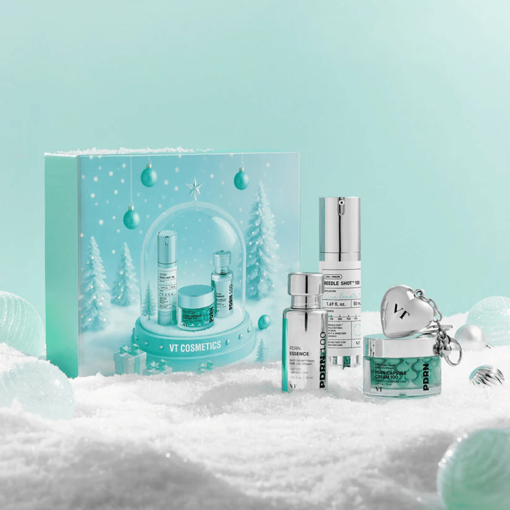 Geschenkverpackung von VT Cosmetics mit Produkten der PDRN-Serie im weihnachtlichen Schneekugel-Design – perfekt als Geschenk.