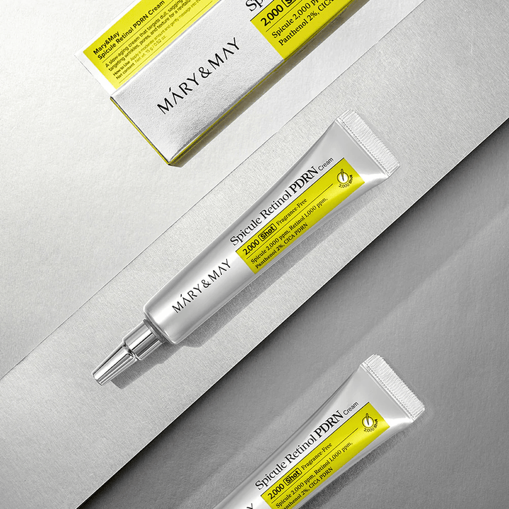 MARY & MAY Spicule Retinol PDRN Cream in Tube und Verpackung auf hellem Hintergrund, eine aktive Gesichtscreme mit Retinol, Spicule-Technologie und PDRN für verbesserte Hautstruktur und Hauterneuerung.