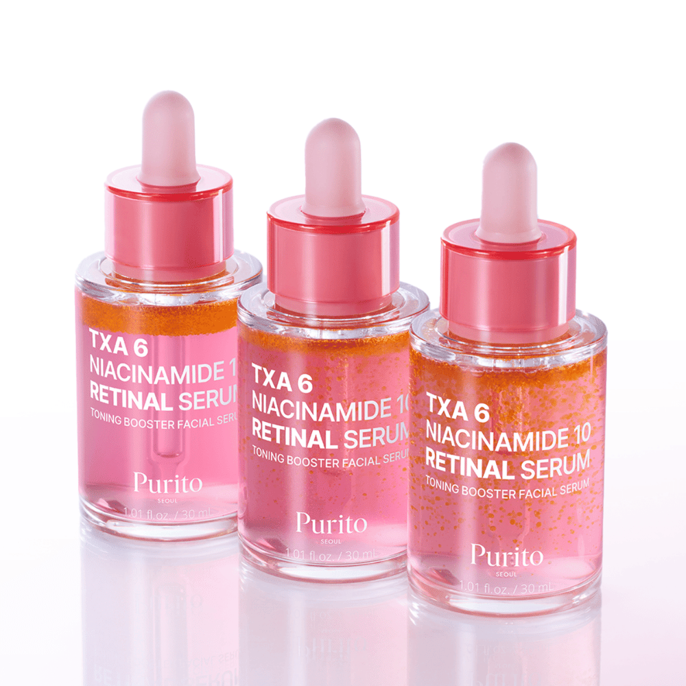 Drei Flaschen von Purito TXA 6 Niacinamide 10 Retinal Serum. Ein strahlendes und glättendes Gesichtsserum mit Anti-Aging-Effekt.