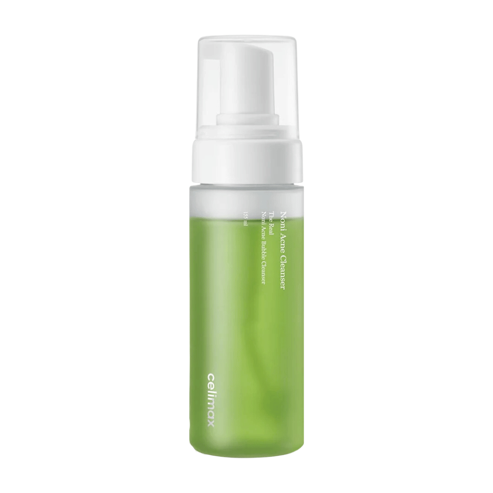 Die Flasche mit The Real Noni Acne Bubble Cleanser zeigt einen frischen und grünen Ton, was auf natürliche Inhaltsstoffe hinweist. Der Pumpenspender macht sie benutzerfreundlich und perfekt, um ein reichhaltiges, schäumendes Reinigungsmittel zu erzeugen. Ideal zur Bekämpfung von Akne und um der Haut ein klares und reines Gefühl zu verleihen.